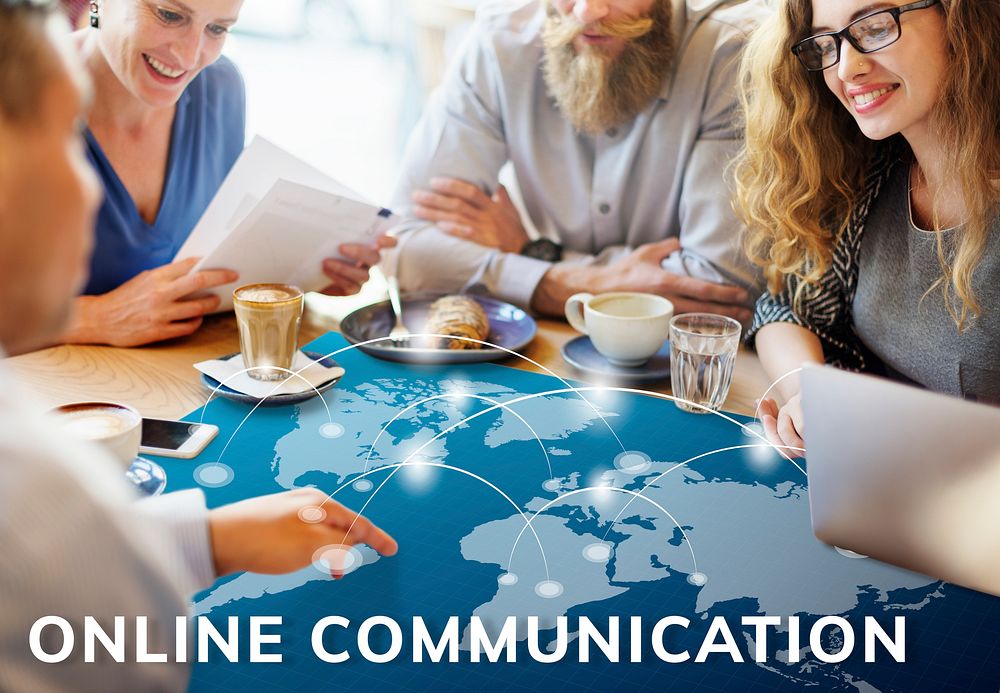 Workers working on banner network graphic on table