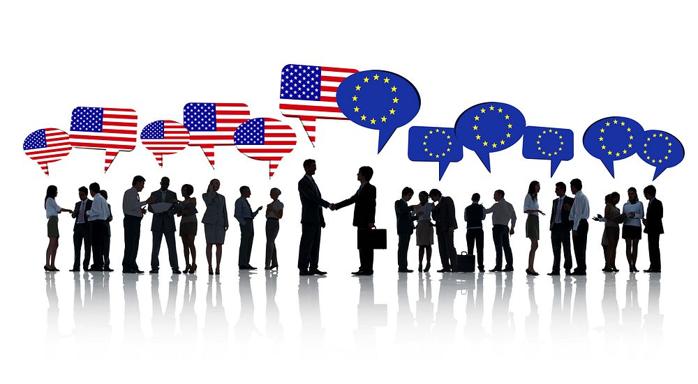 Group Of American And European Business People Talking To Each Other In A White Background