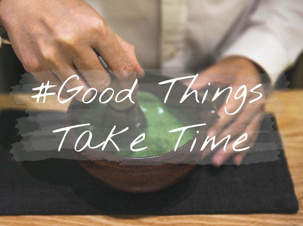 Hands with Japanese Green Tea and Good things Take Time Quote