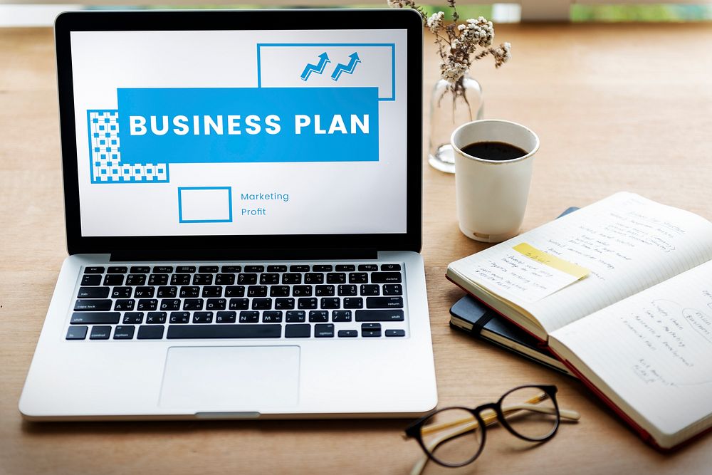 Startup new business competition plan word on laptop