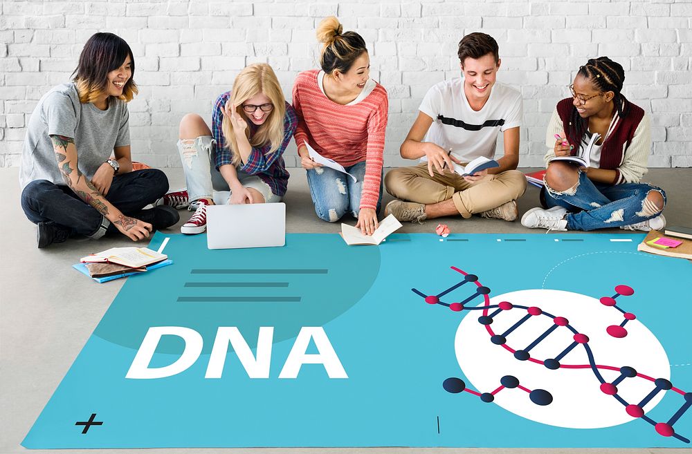 Group of students studying dna genetics graphic on the floor