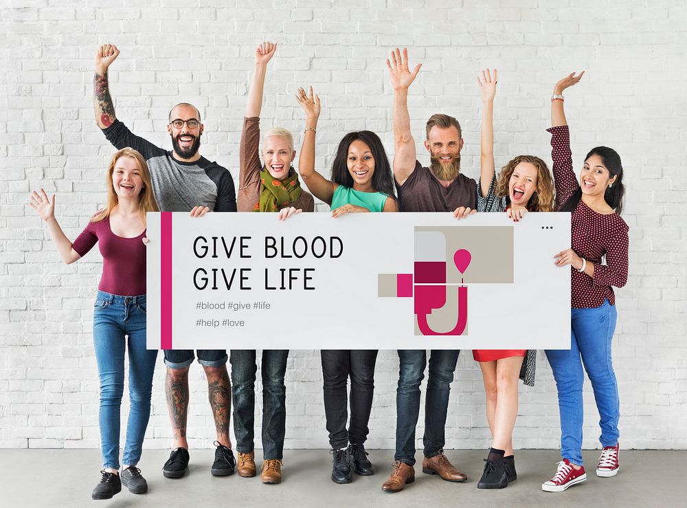 Group of people holding banner of blood donation campaign