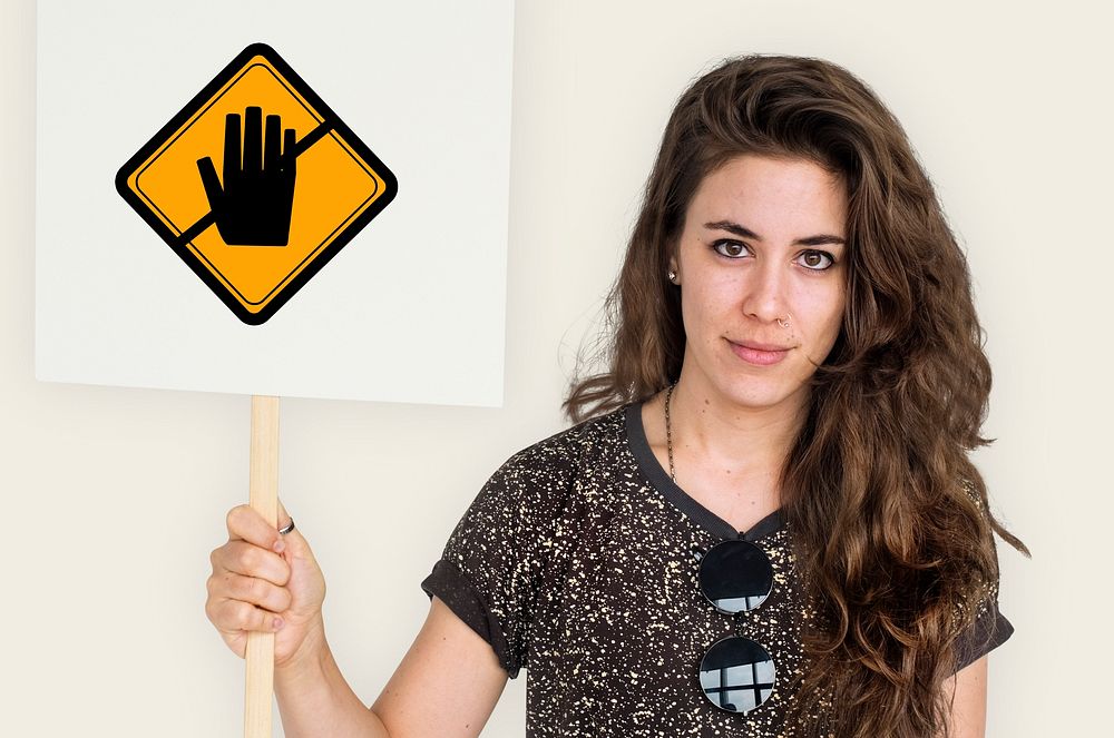 Studio Shoot Holding Banner with Don't Touch Caution Sign