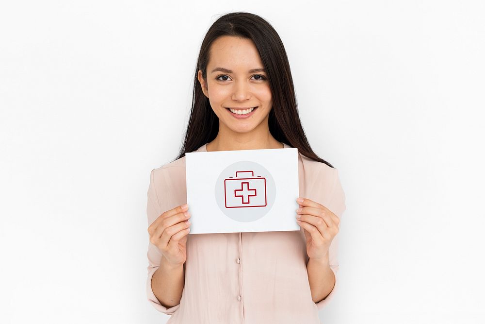 Women holding a card with healthcare concept