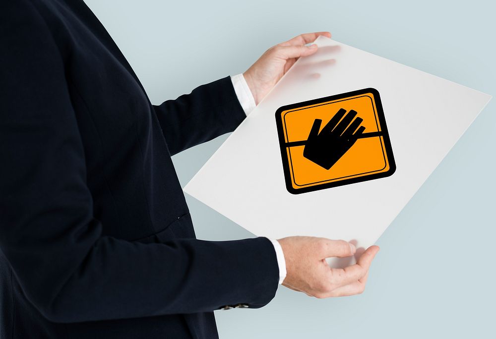 Studio Shoot Holding Banner with Don't Touch Caution Sign