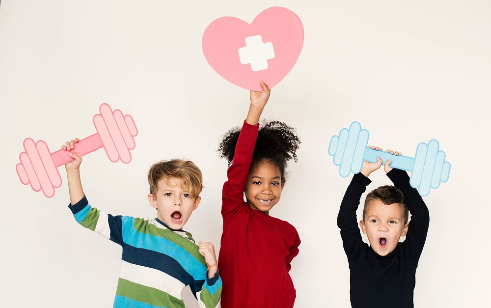 Kids holding health icons