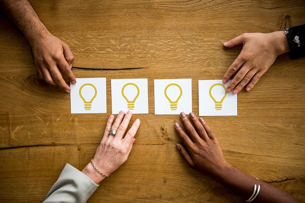 Lightbulb for ideas and creativity icon with people photoshoot