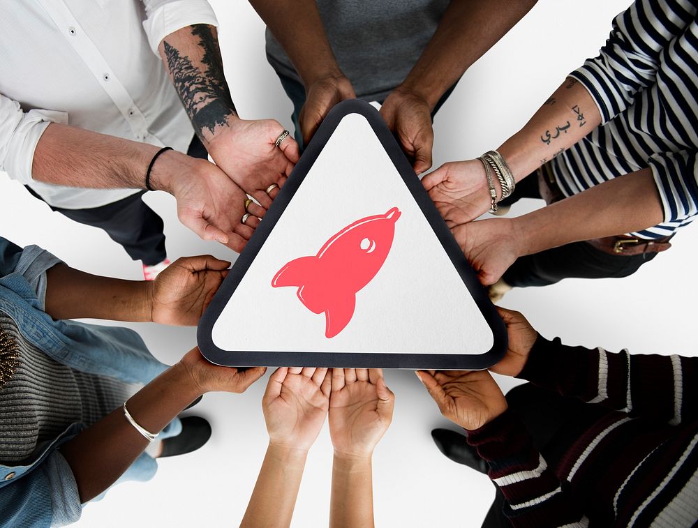 Group of people team with rocket start up icon