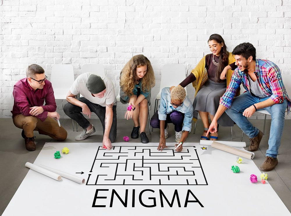 Group of people brainstorming about enigma concept
