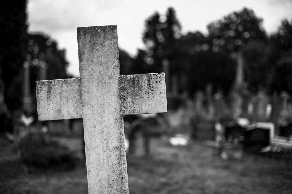 Stone cross at a graveyard