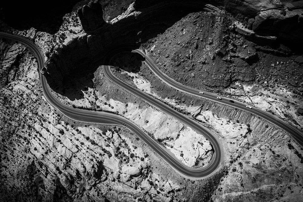 Drone shot of a desert curve road