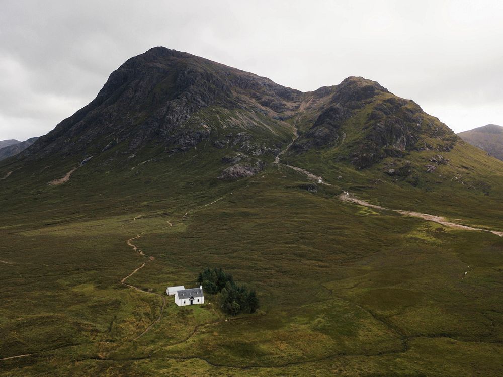 Drone view of cottage at Buachaille Etive Mor in Glen Coe, Scotland