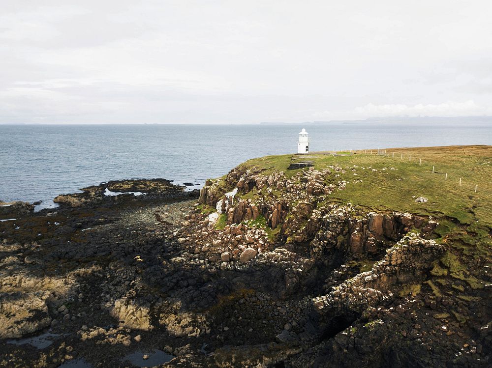 Drone shot of Vaternish Lighthouse at Isle of Skye, Scotland