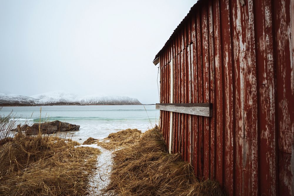 Rusty red cabin on Lofoten island, Norway 