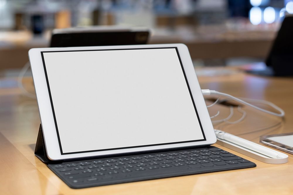 Blank tablet with keyboard product showcase in a shop