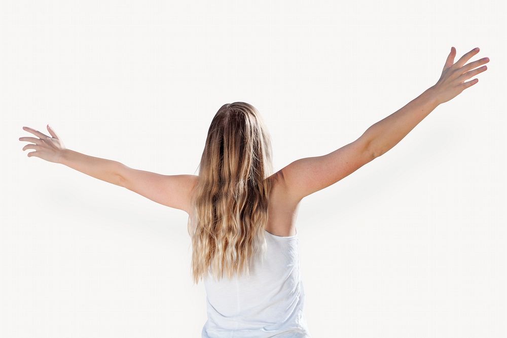 Carefree woman raising arms isolated image