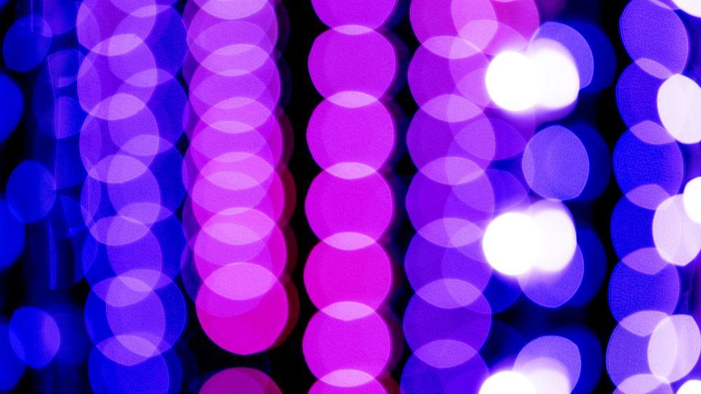 Blue and pink bokeh lights patterned background