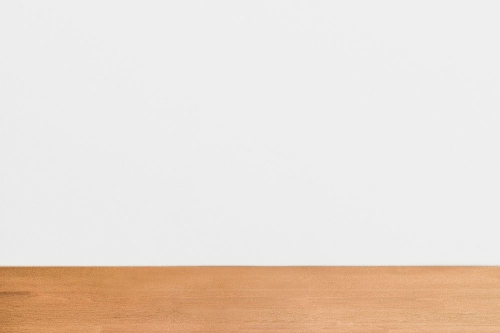 White wall with wooden floor background