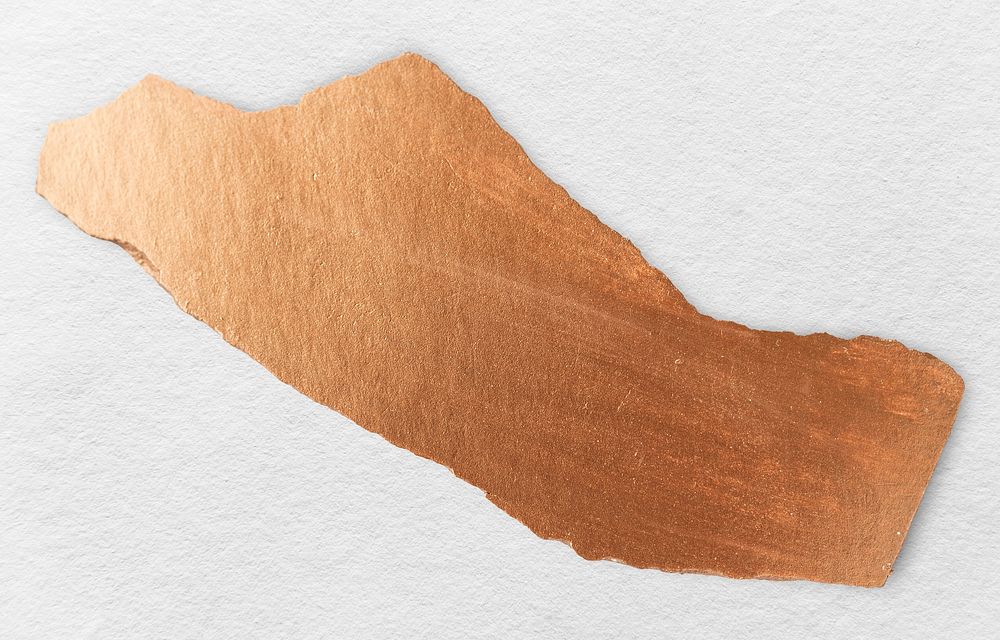 Shiny copper paint on a piece of paper