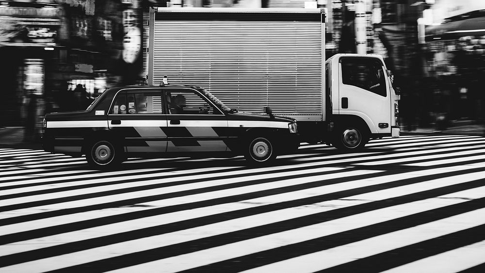 Cars on a crosswalk in Japan