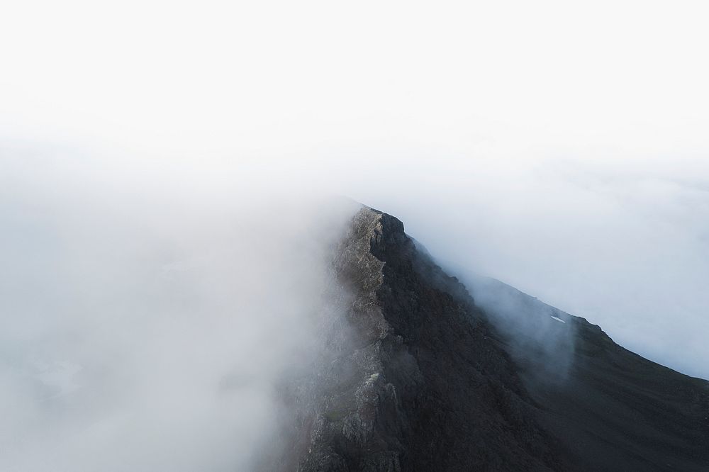Cloudy knife edge ridge mountain