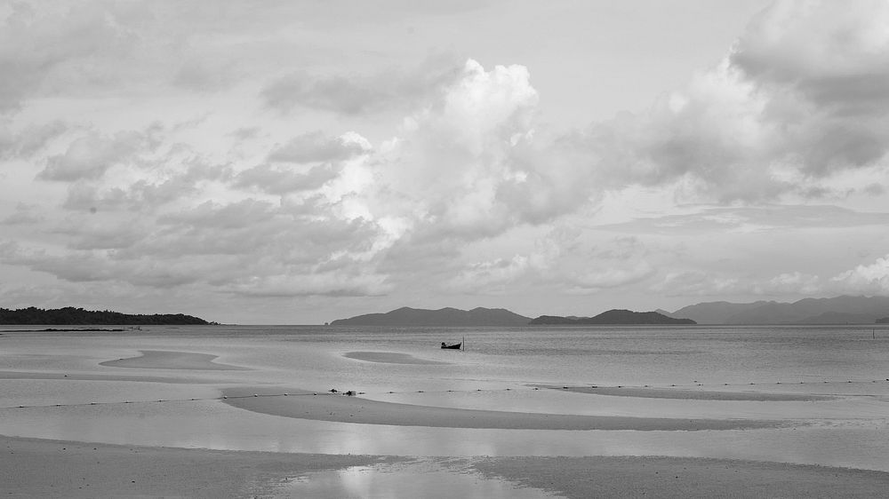 Black and white scenic beach and mountain view