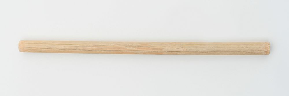 Reusable bamboo wood straw on off white  background