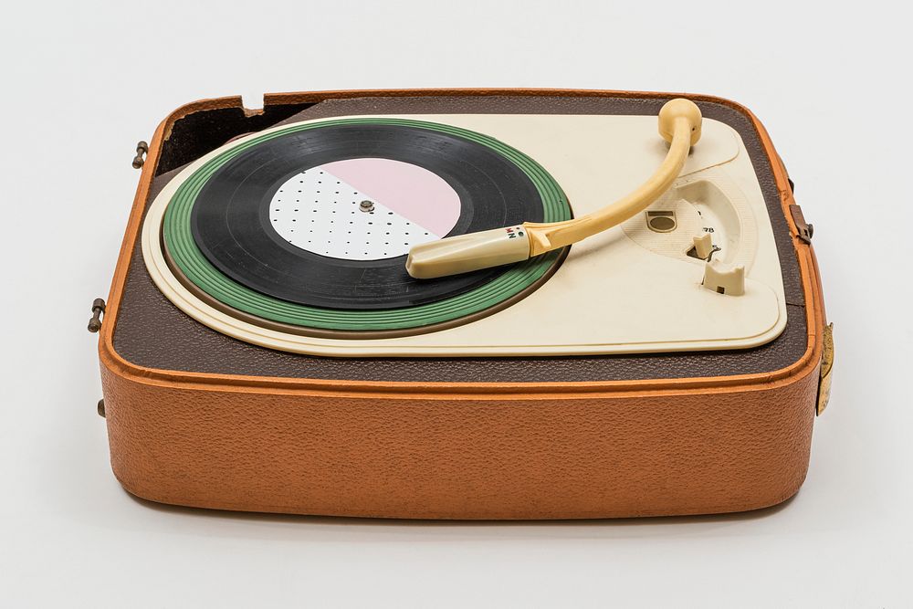 Vintage vinyl turntable in brown leather case