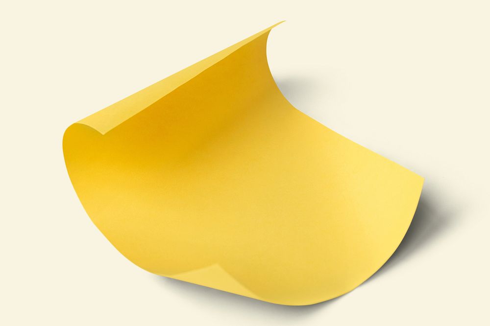 Blank yellow curled paper mockup on a beige background