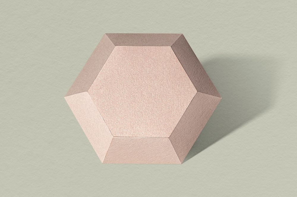 3D pink diamond shaped paper craft on a sage green background