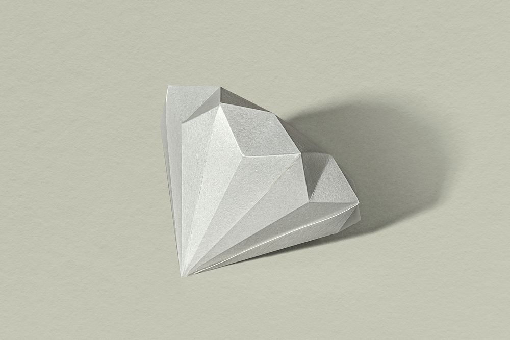 3D silver diamond shaped paper craft on a sage green background
