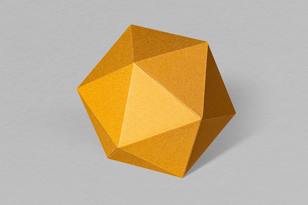 3D golden hexagon shaped paper craft on a gray background