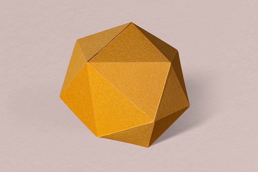 3D golden pentagon shaped paper craft on a dull pink background