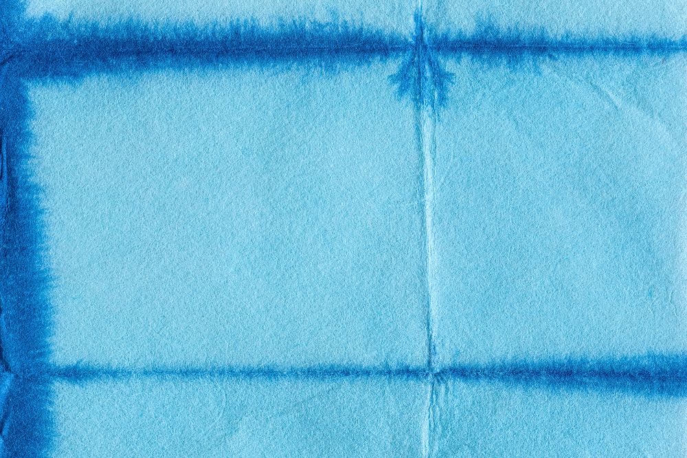 Indigo shibori textured blue background
