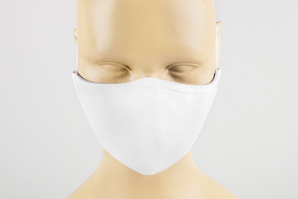 White fabric face mask on a mannequin