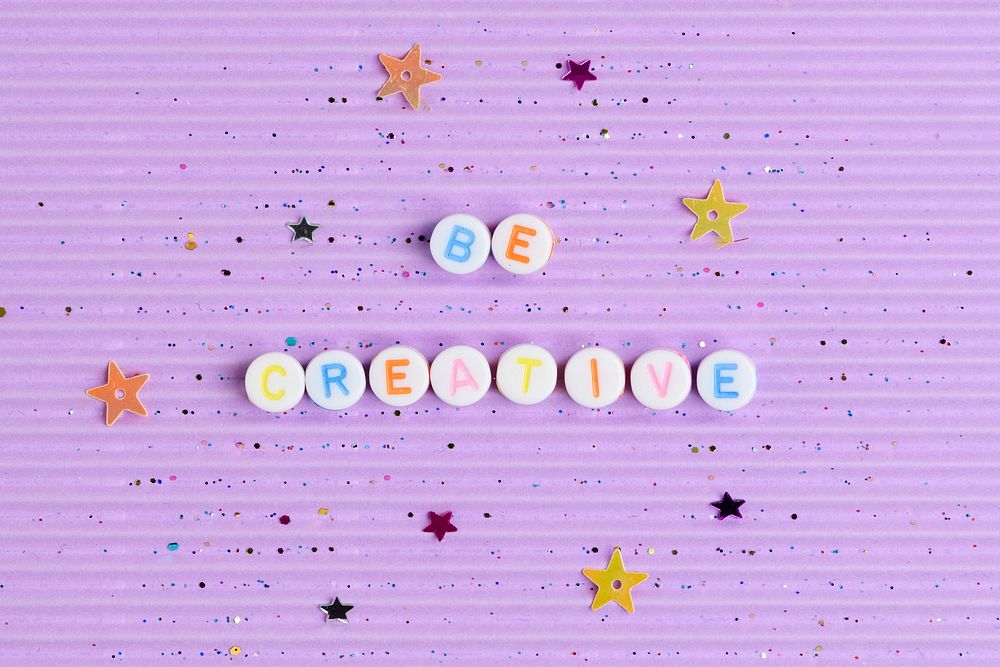 Be creative alphabet beads purple background