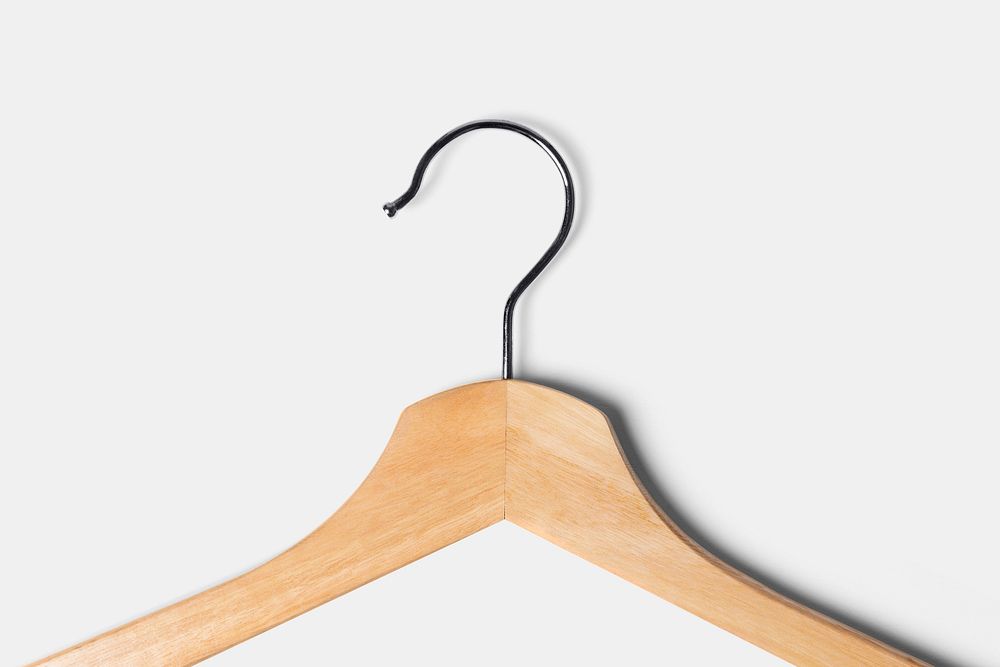 Light wooden clothes hanger closeup