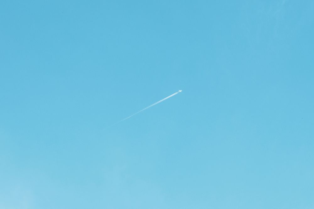 Airplane in a clear blue sky