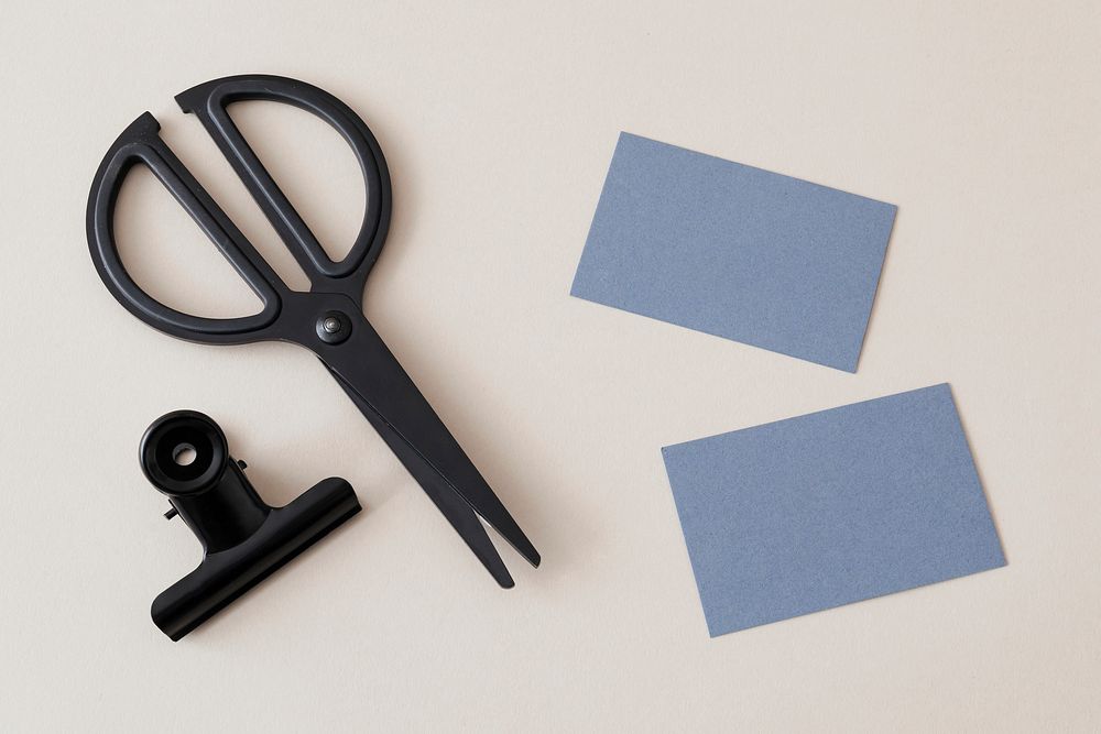 Blank design card and black scissors