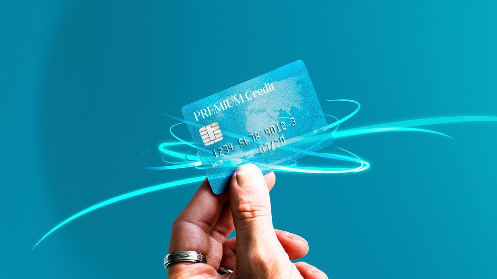 Woman holding a premium credit card