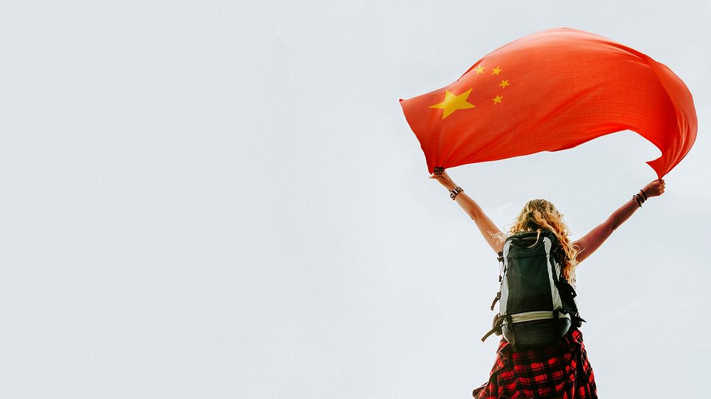 Woman holding the Chinese flag