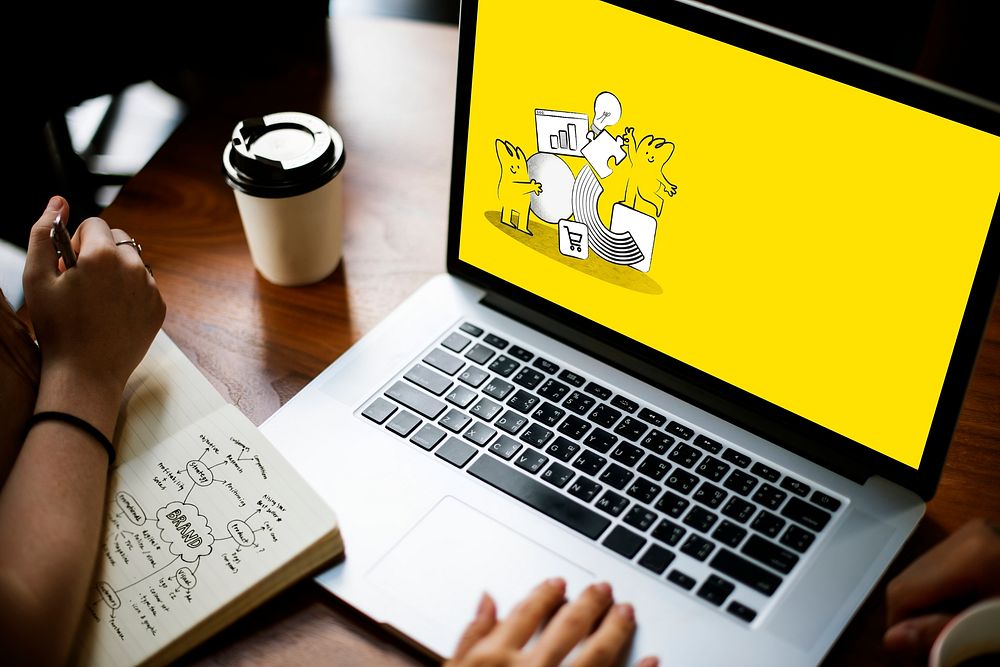 Yellow screen laptop on Free Photo rawpixel