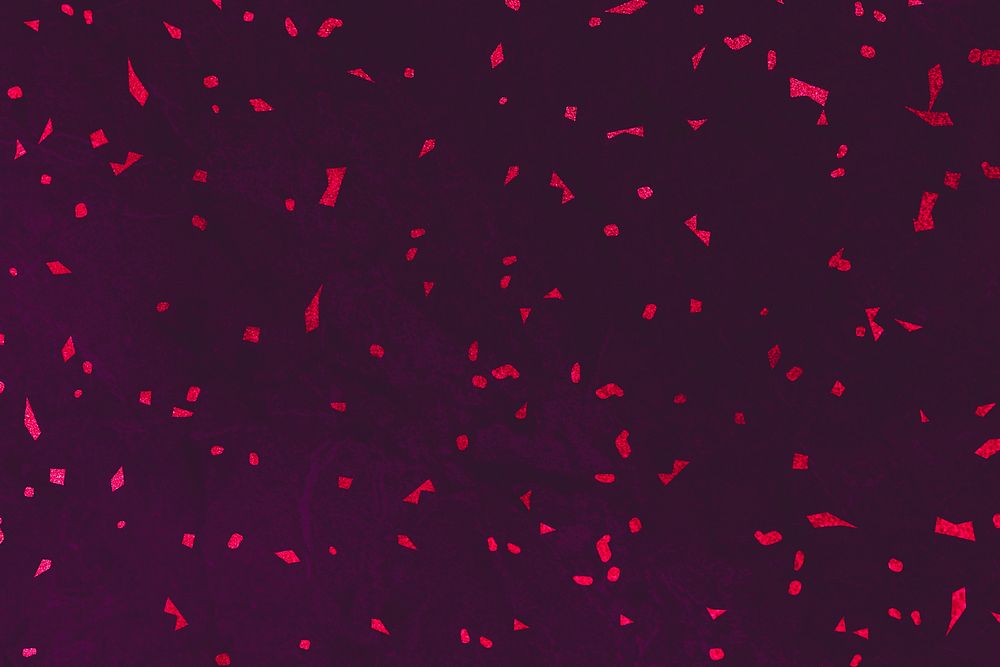 Red confetti on purple marble textured background