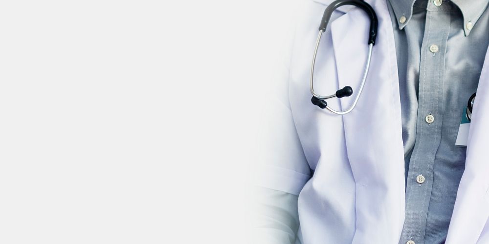 Stethoscope on a doctors gown background