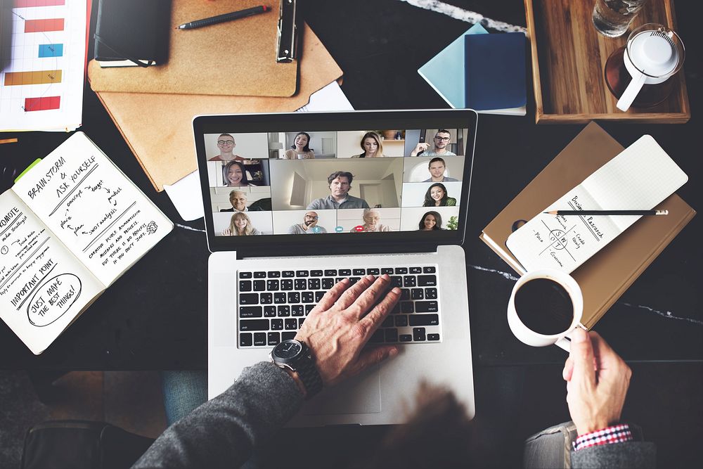 Businessman in a video conference call while working from home during the coronavirus pandemic