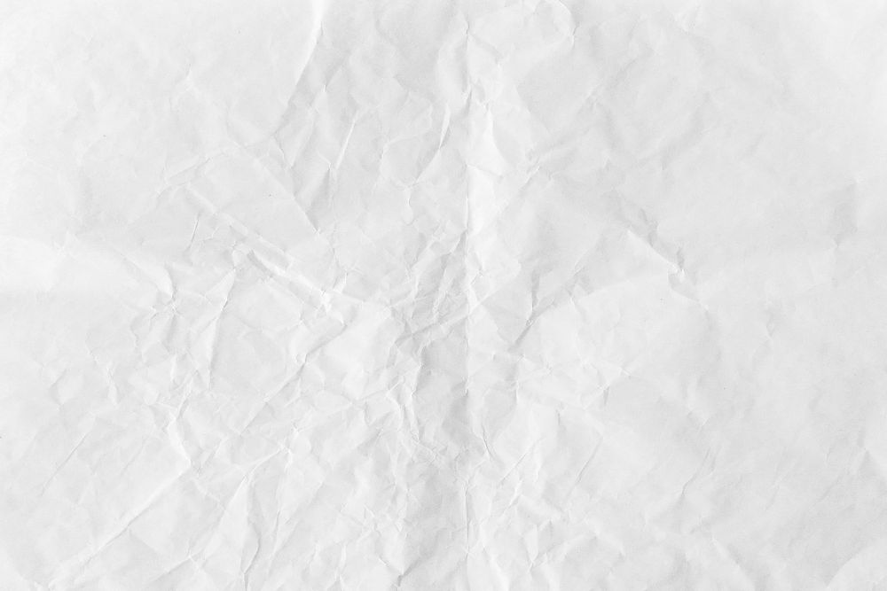 Crumpled white paper textured background