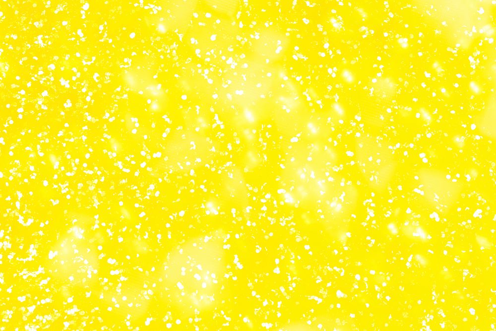 Yellow glitter pattern on a gray background