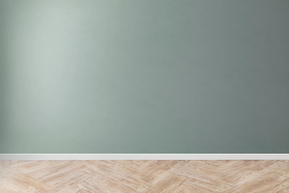 Green blank concrete wall mockup with a wooden floor