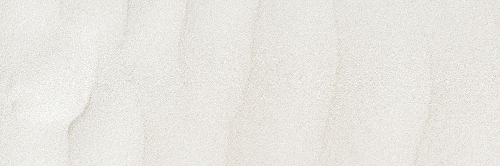 White sand textured background with copy space 