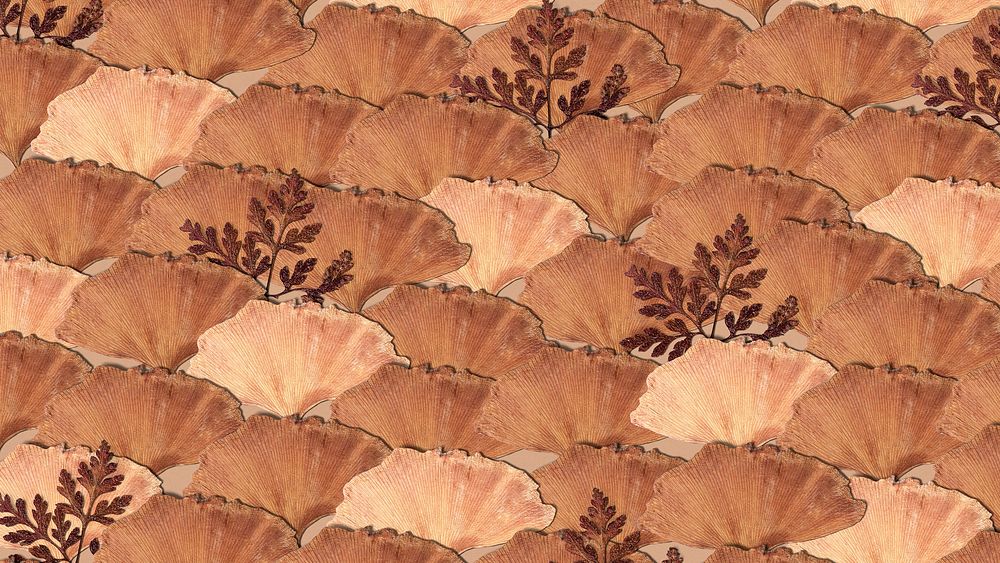 Dried leaf patterned background in beige